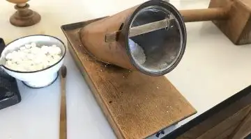 Old pharmacy pill filler with pills material in exposition History of pharmacies in Kuks Hospital in Kuks, Trutnov District